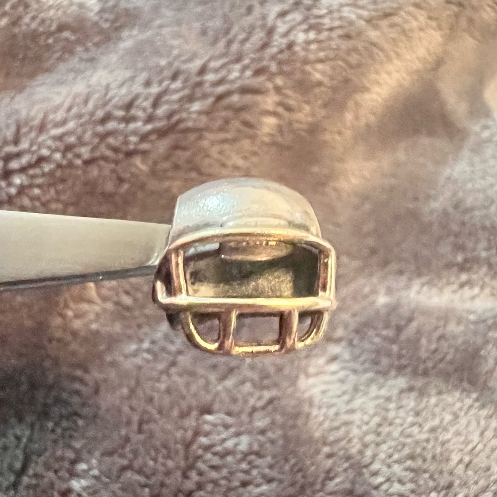 Pandora football helmet charm.